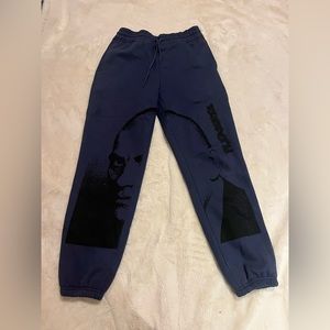 Pleasures, blue sweatpants with logo and face